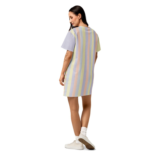 All-over print pastel t-shirt dress, abstract color panel design in soft yellow, lavender, peach, and grey, back view