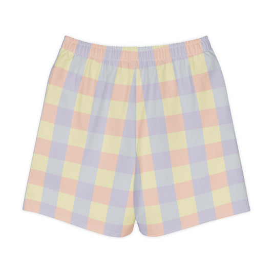 Long shorts in abstract pastel color panels, soft yellow, lavender, peach, and grey tones, relaxed unisex fit, back view.