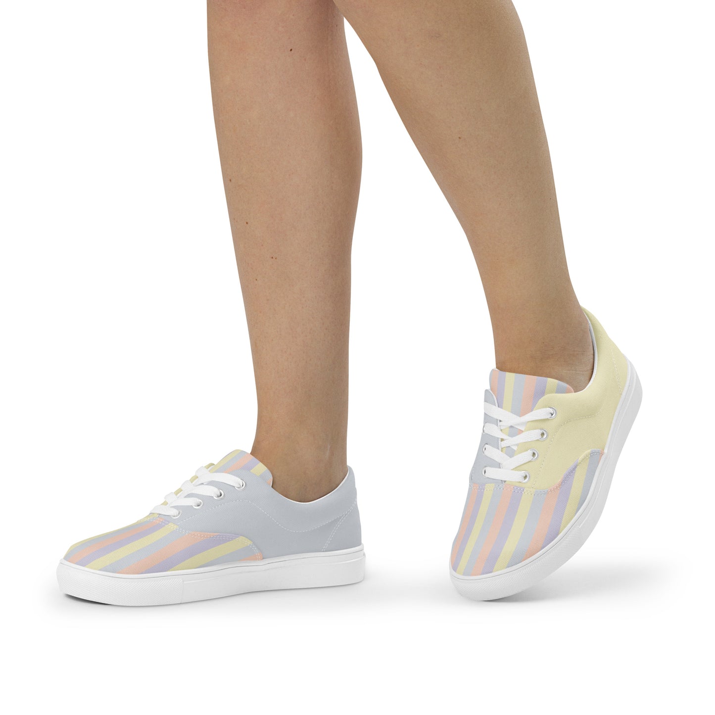 Pastel abstract print lace-up canvas sneakers with matching soles and laces, soft yellow, lavender, peach, and grey color panels