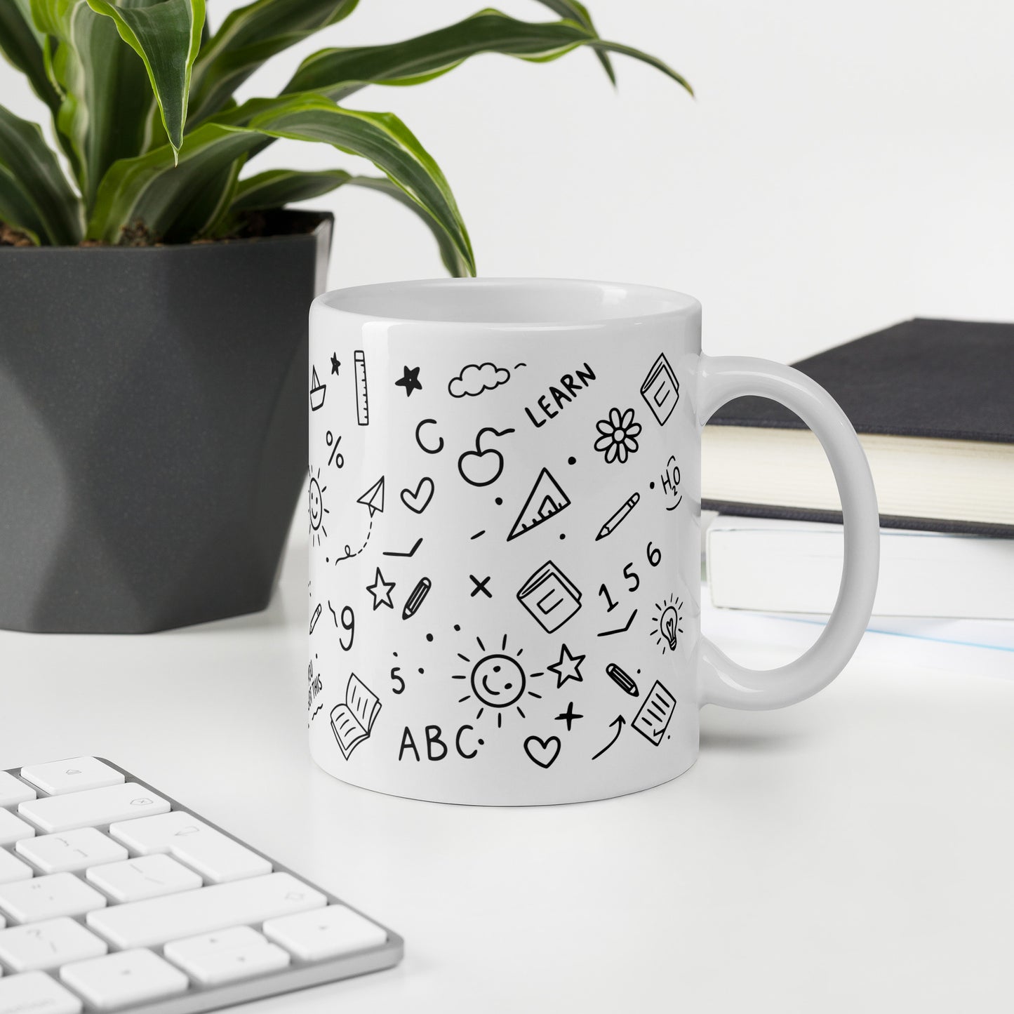 11oz white glossy mug with hand-drawn school doodle print — close-up of illustrated details