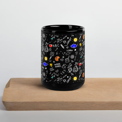 Black glossy ceramic mug with hand-drawn school doodle illustration — books, pencils, numbers and happy faces on a bold dark finish