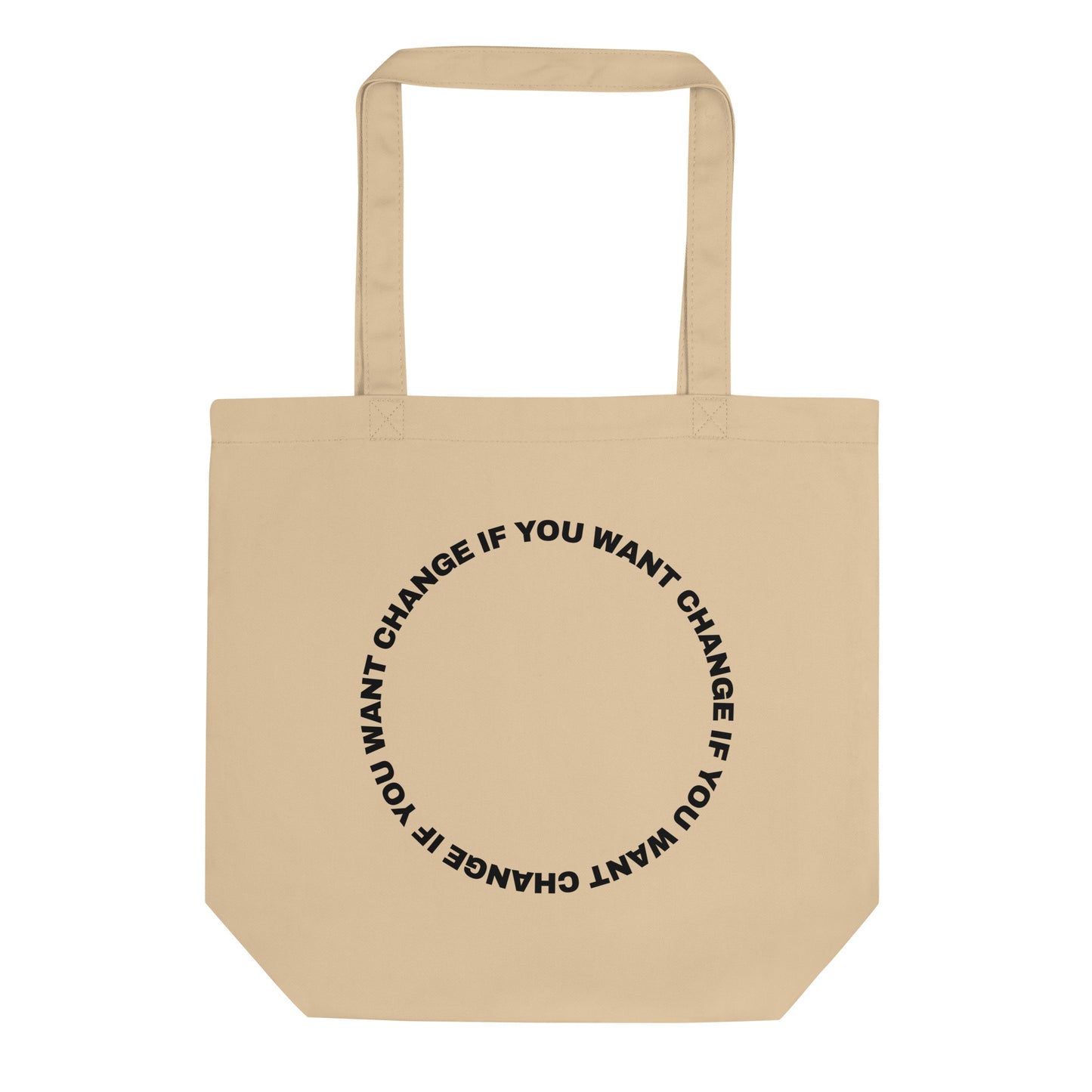 Black text loop reading change if you want change wrapped in a circle on a small organic cotton tote bag