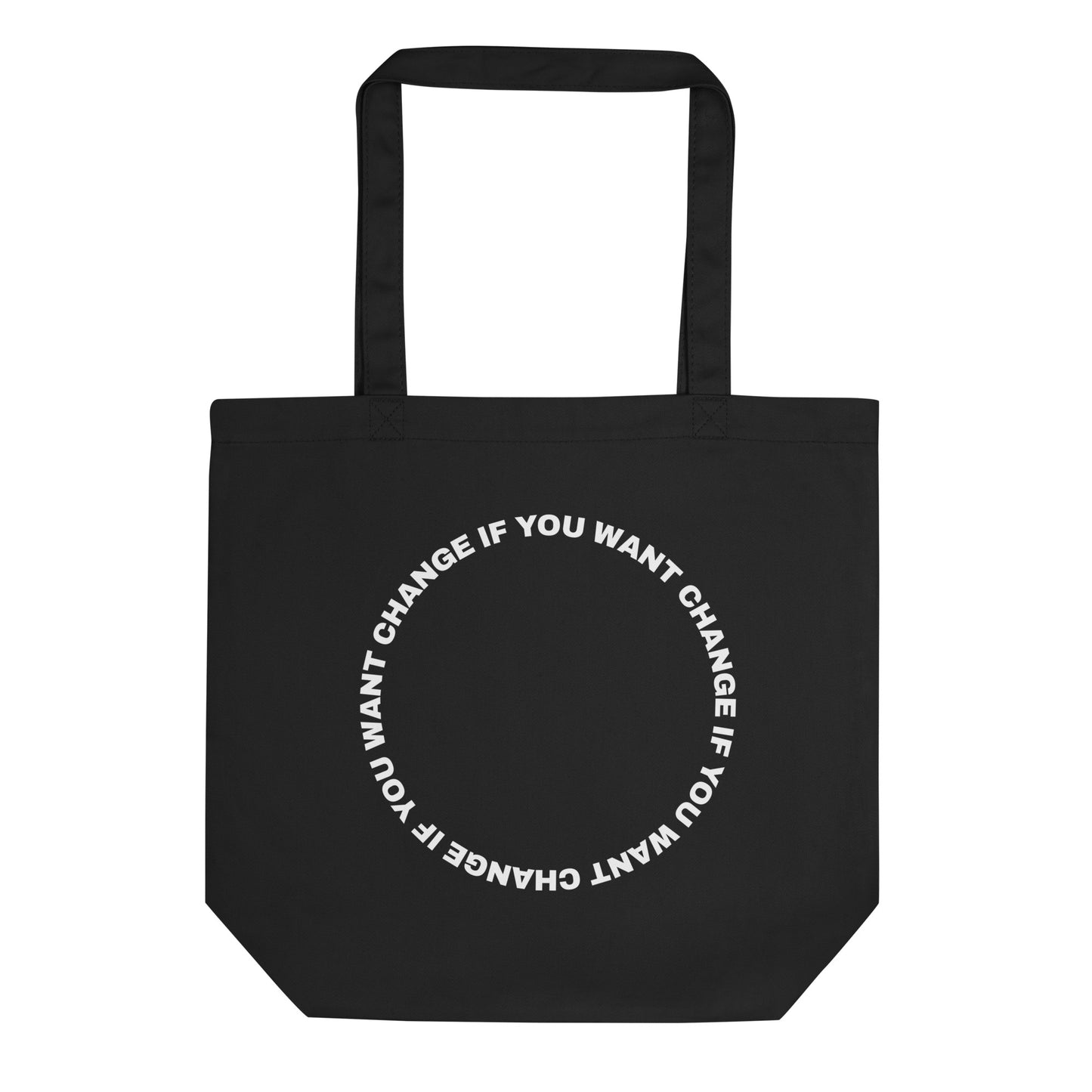 White text loop reading change if you want change wrapped in a circle on a small organic cotton tote bag