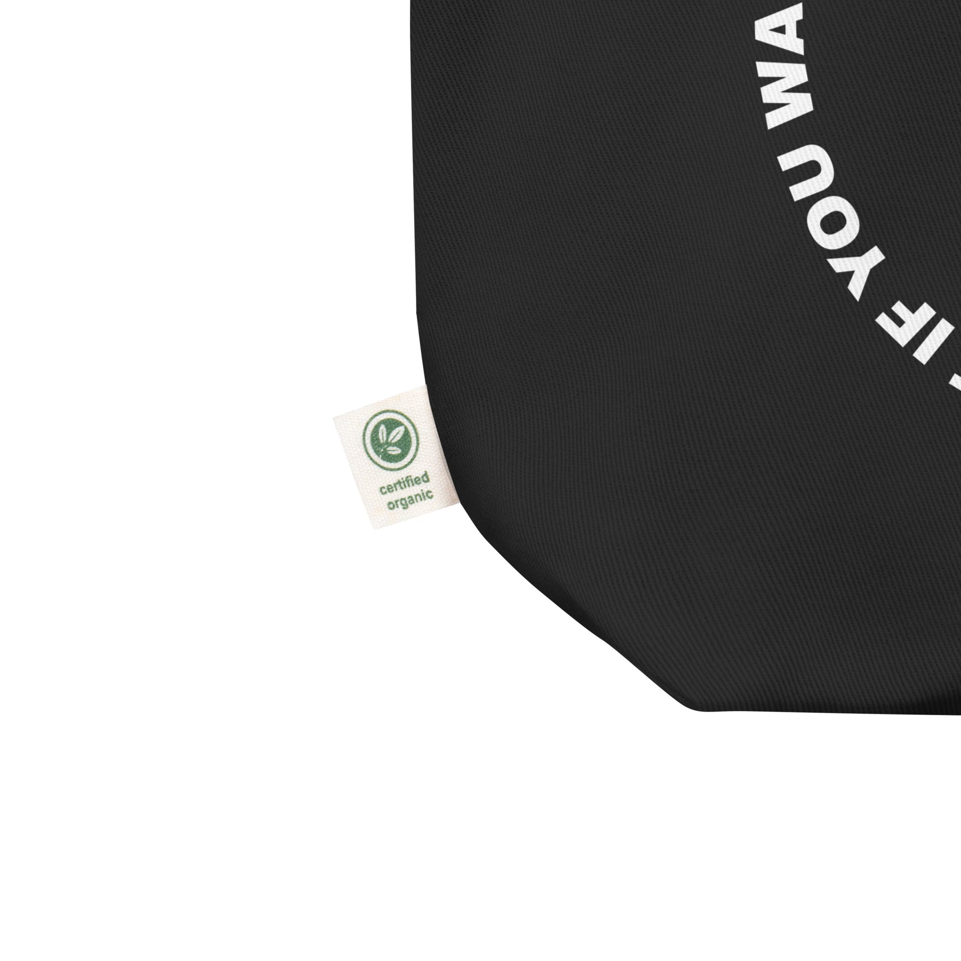 Close-up of the white circular quote design on the eco tote's front panel