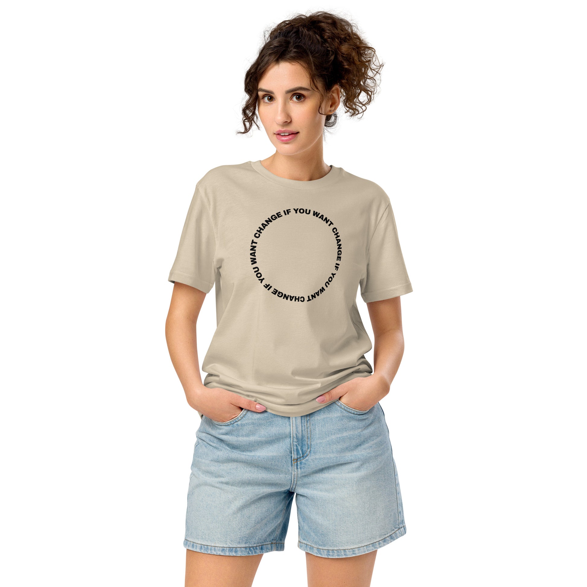 Black text loop reading change if you want change wrapped in a circle on an organic mid-light t-shirt
