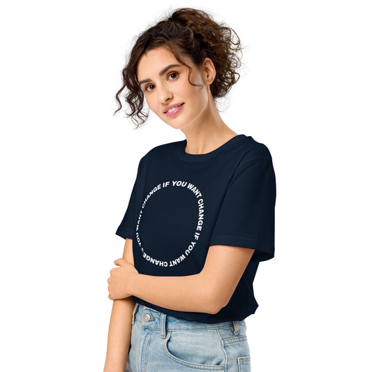 White text loop reading change if you want change wrapped in a circle on an organic mid-light t-shirt