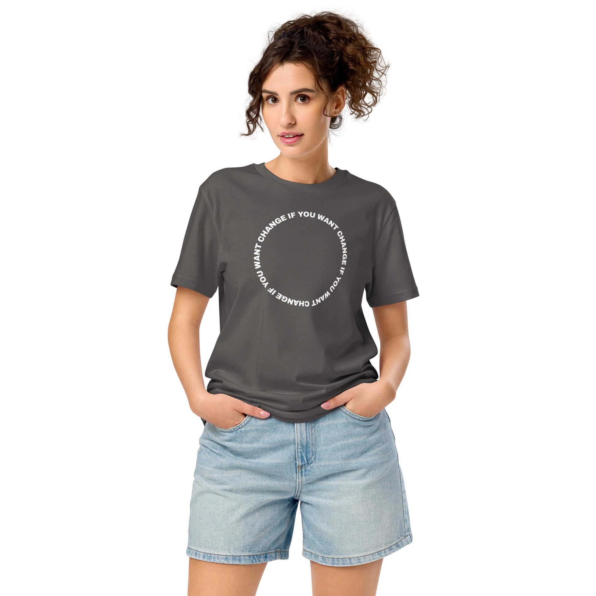 The white circular quote design on the organic t-shirt's chest