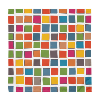 Set of four colorful mosaic cloth napkins featuring a vibrant pattern of slightly tilted squares in orange, blue, green, magenta, and yellow on a white background.