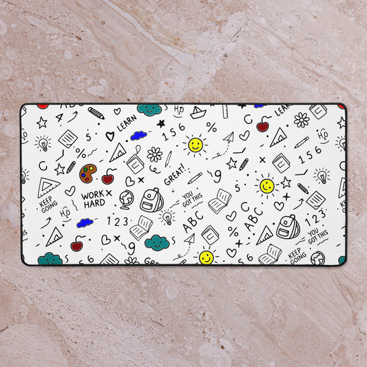 Desk mat with colorful hand-drawn school doodle illustration — books, pencils, numbers and happy faces on a smooth polyester surface