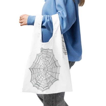 Find the Spider shopping bag —  spiderweb print on white reusable polyester bag with hidden spider