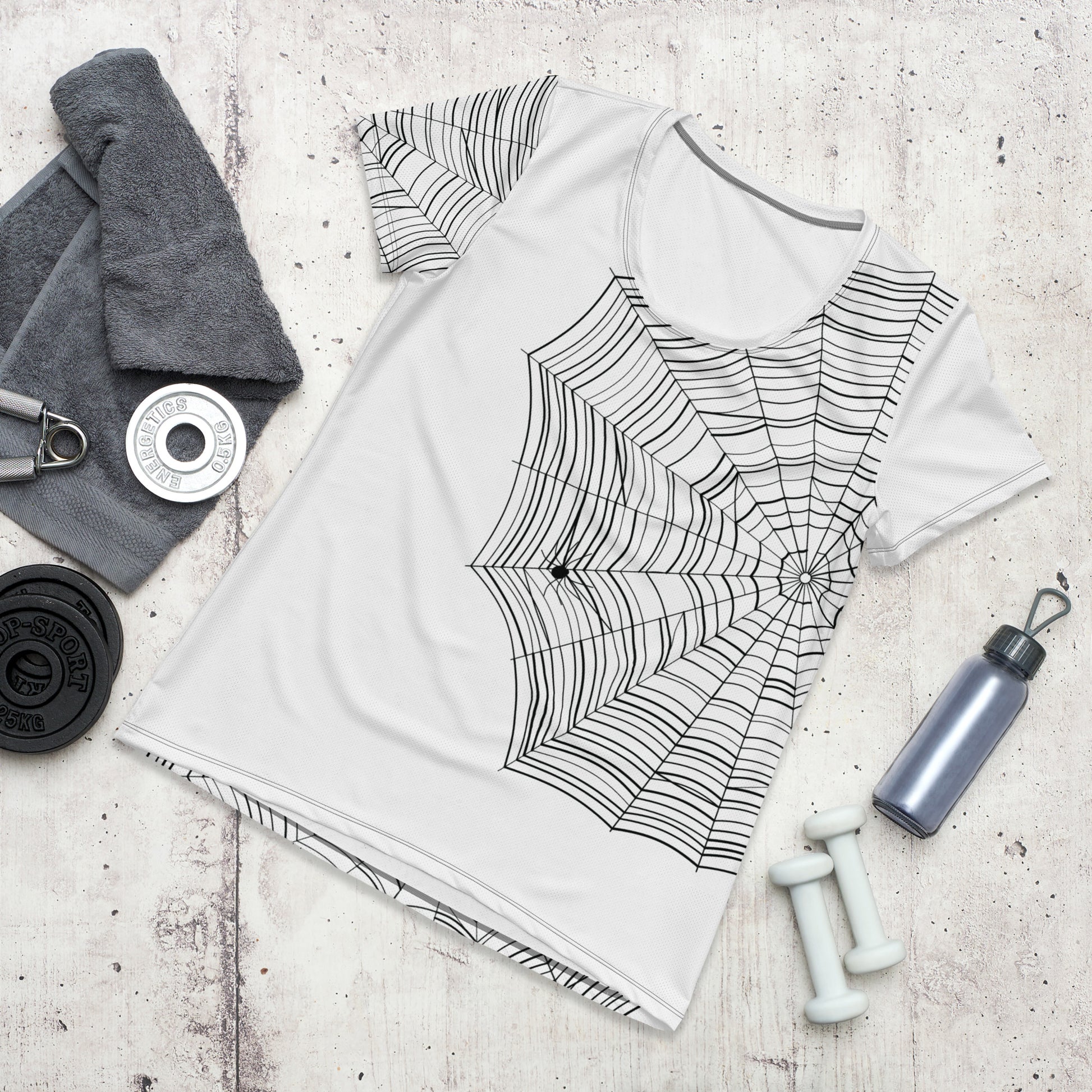 Find the Spider women's athletic t-shirt —  spiderweb print on white sports tee with hidden spider detail