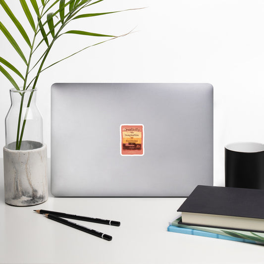 Formula No. 9 Muse Awakening bubble-free sticker on a laptop, creativity art in warm terracotta palette