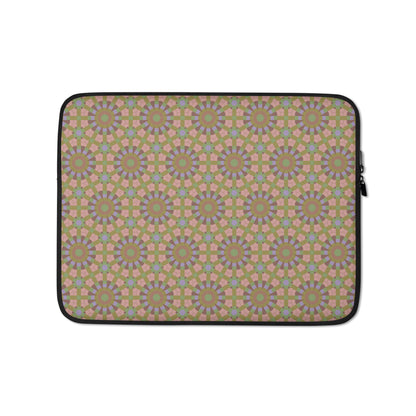 Laptop sleeve with an all-over seamless hexagon and starburst pattern in sage green, dusty rose, and lavender — shown flat against a neutral background.
