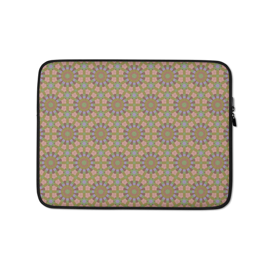 Laptop sleeve with an all-over seamless hexagon and starburst pattern in sage green, dusty rose, and lavender — shown flat against a neutral background.
