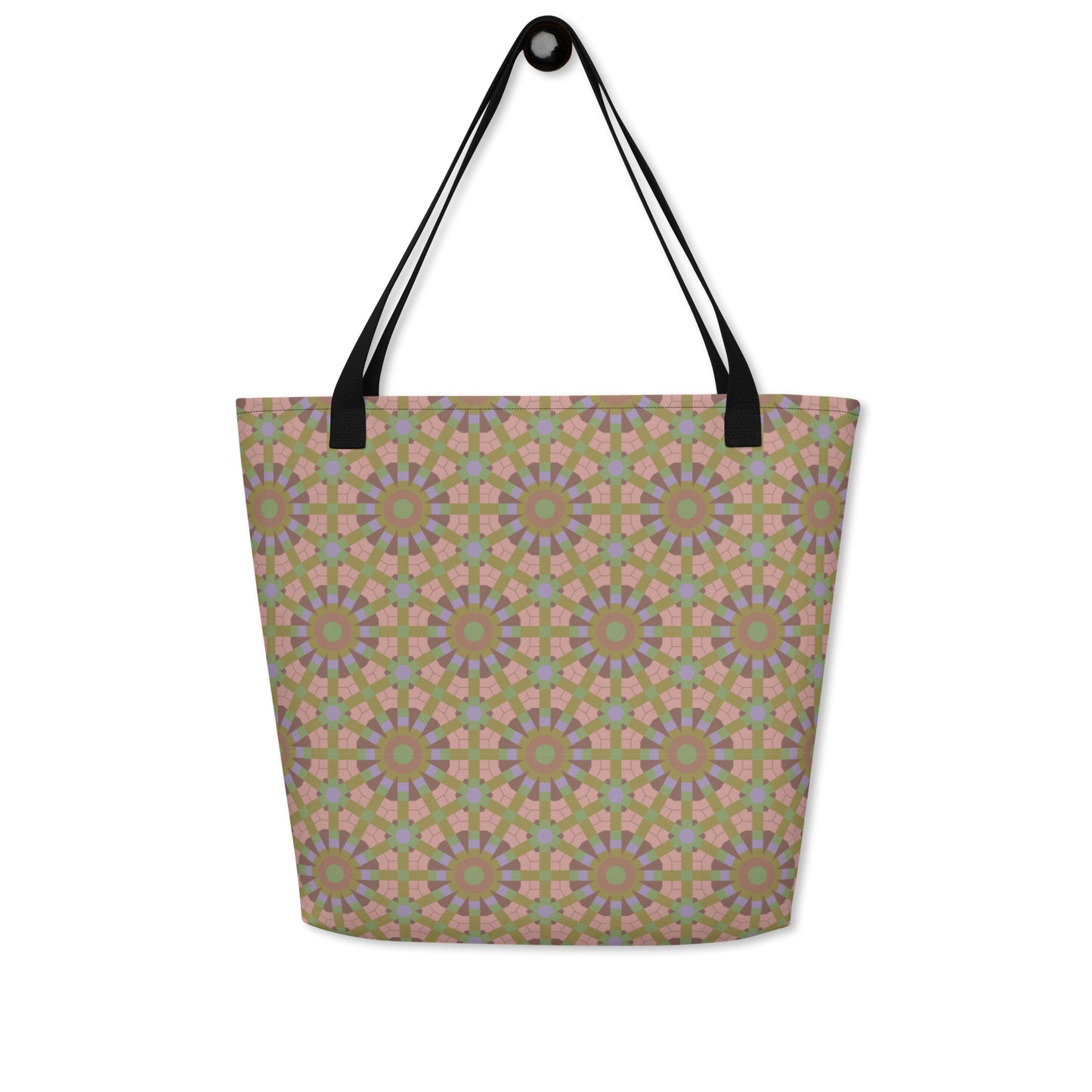 Large tote bag with an all-over seamless geometric hexagon and starburst print in sage green, dusty rose, and lavender, with cotton webbing handles.