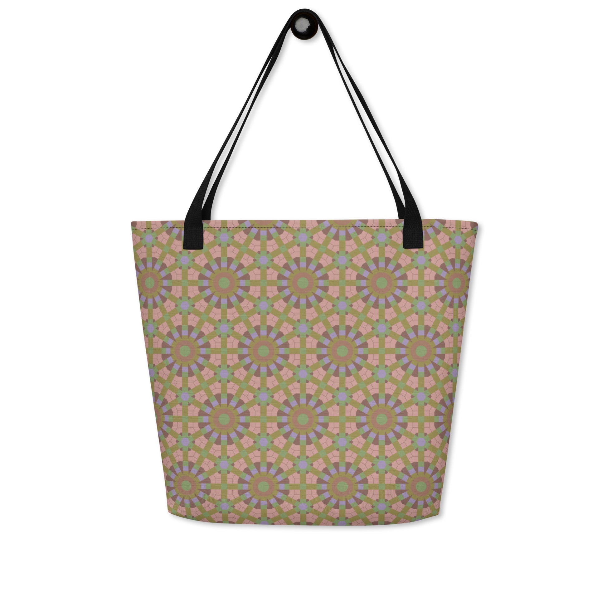 Large tote bag with an all-over seamless geometric hexagon and starburst print in sage green, dusty rose, and lavender, with cotton webbing handles.