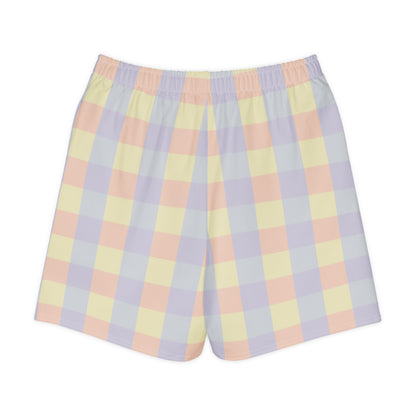Long shorts in abstract pastel color panels, soft yellow, lavender, peach, and grey tones, relaxed unisex fit, back view.