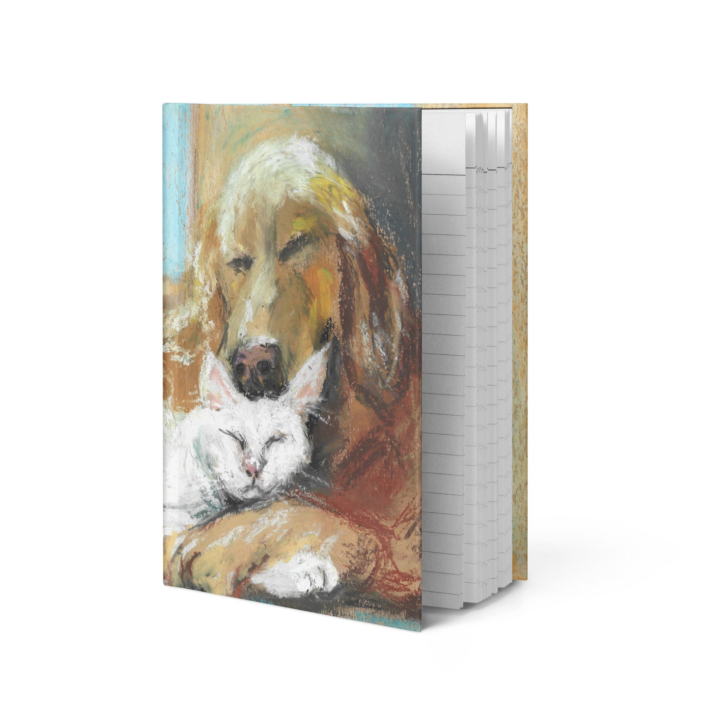 Close-up of matte journal cover with pastel dog and cat illustration — lined cream pages visible, flexible spine