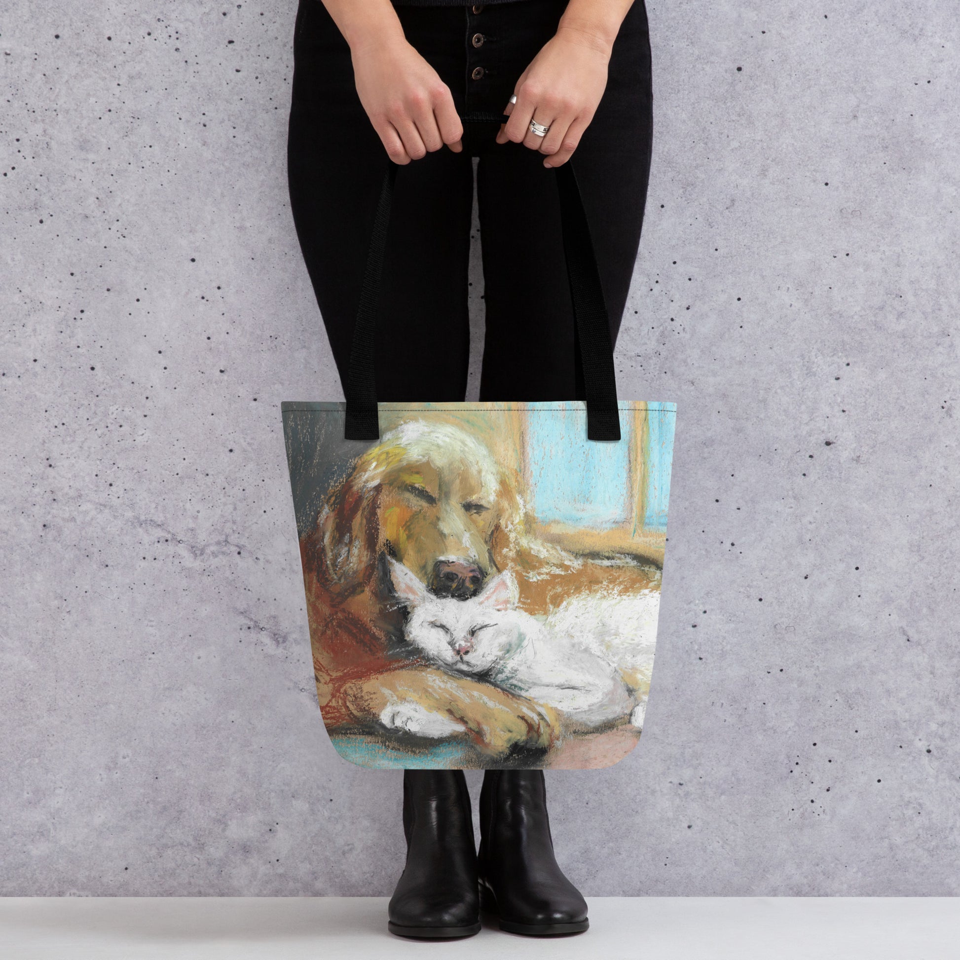 Tote bag with soft pastel golden retriever and white cat illustration by Lena Kloper — 100% polyester body with cotton denim handles