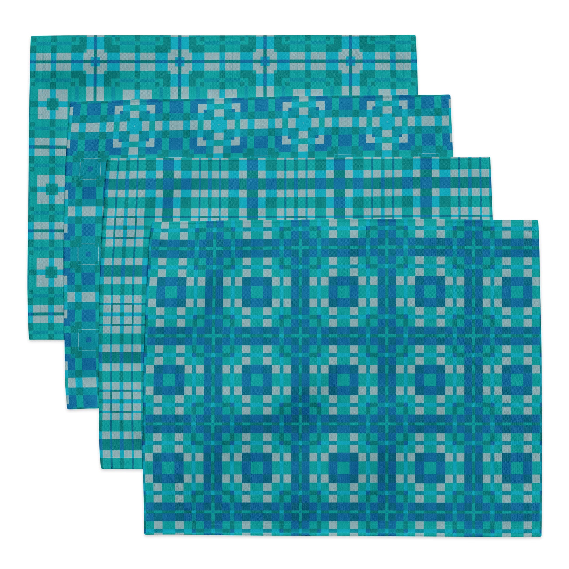 Four Pixel Azulejo placemats laid out flat displaying full Portuguese-inspired turquoise tile