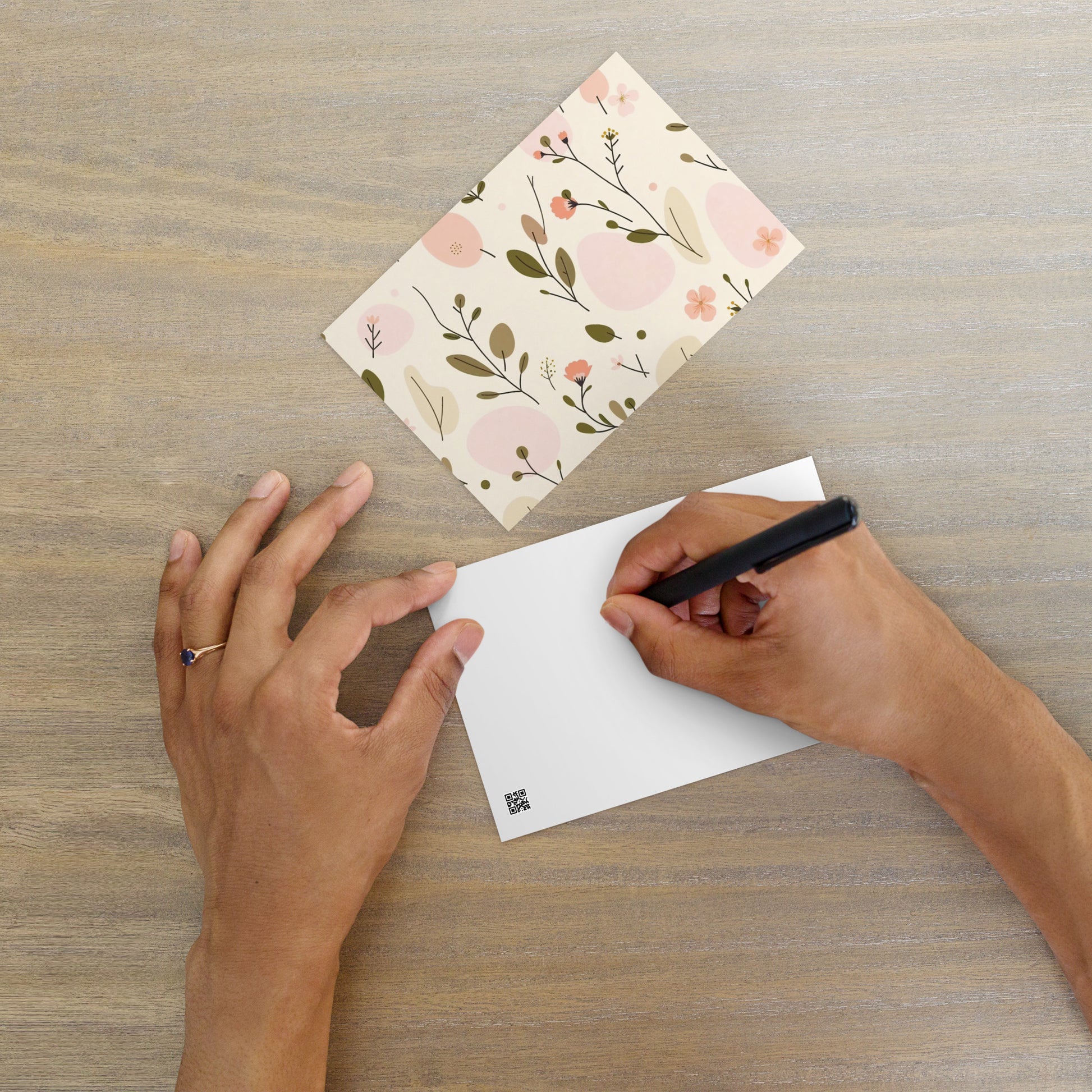 Soft Bloom landscape postcard — floral pattern in peach and olive green on cream, horizontal format front view