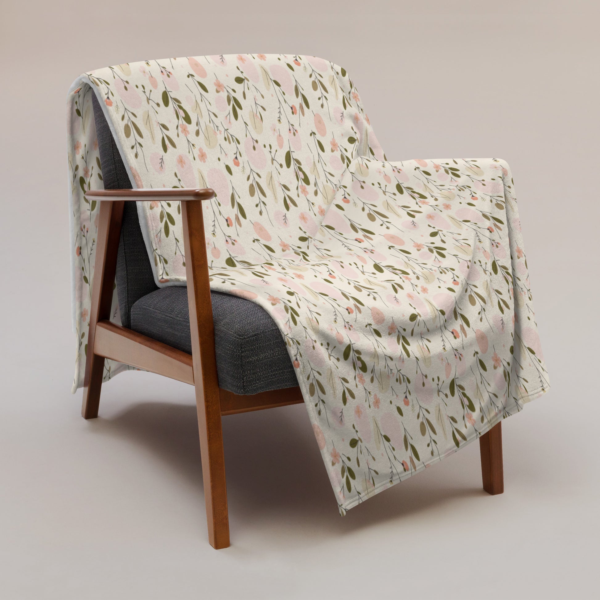 Throw blanket with Soft Bloom romantic botanical print in peach pink and olive green