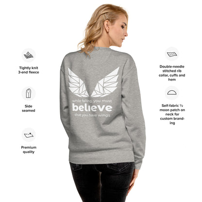 Unisex crewneck sweatshirt with ribbed collar and flat hem, from the while falling you must believe you have wings design.