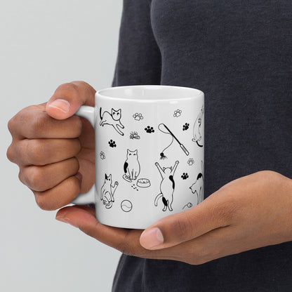 Life of Cats illustrated mug showing playful cats and paw prints, white ceramic glossy finish