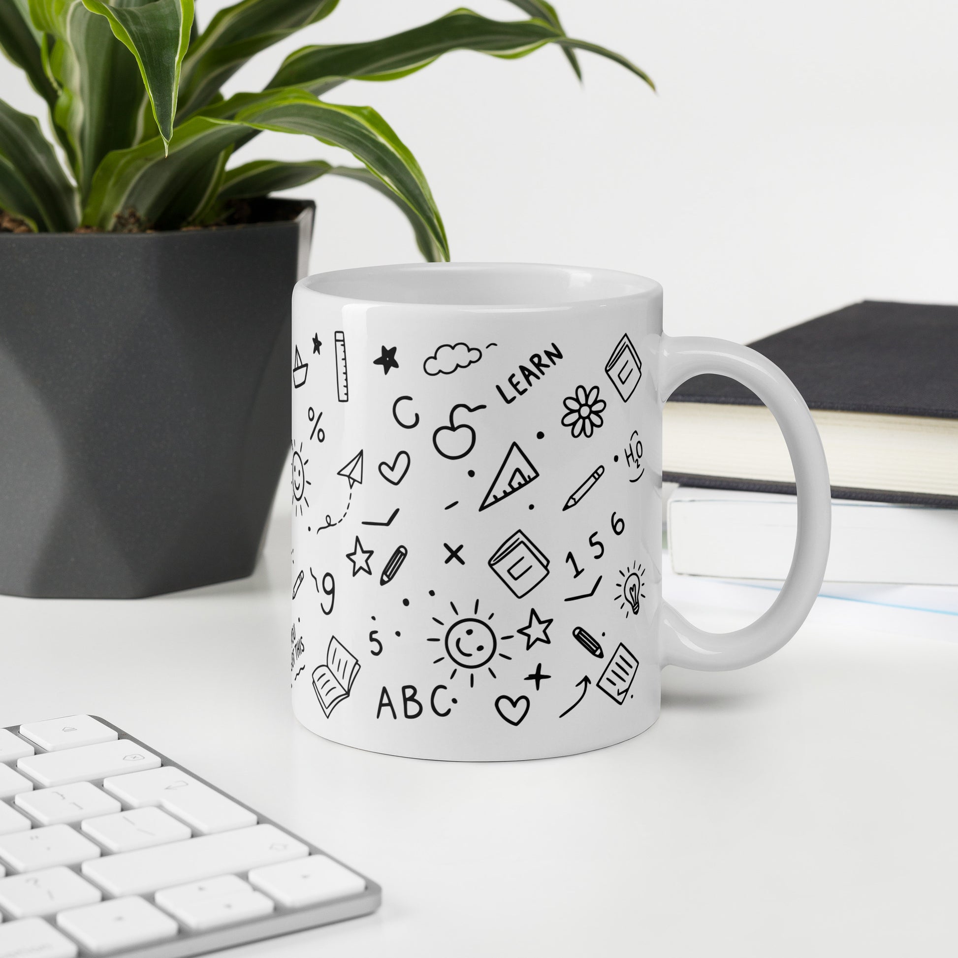 11oz white glossy mug with hand-drawn school doodle print — close-up of illustrated details