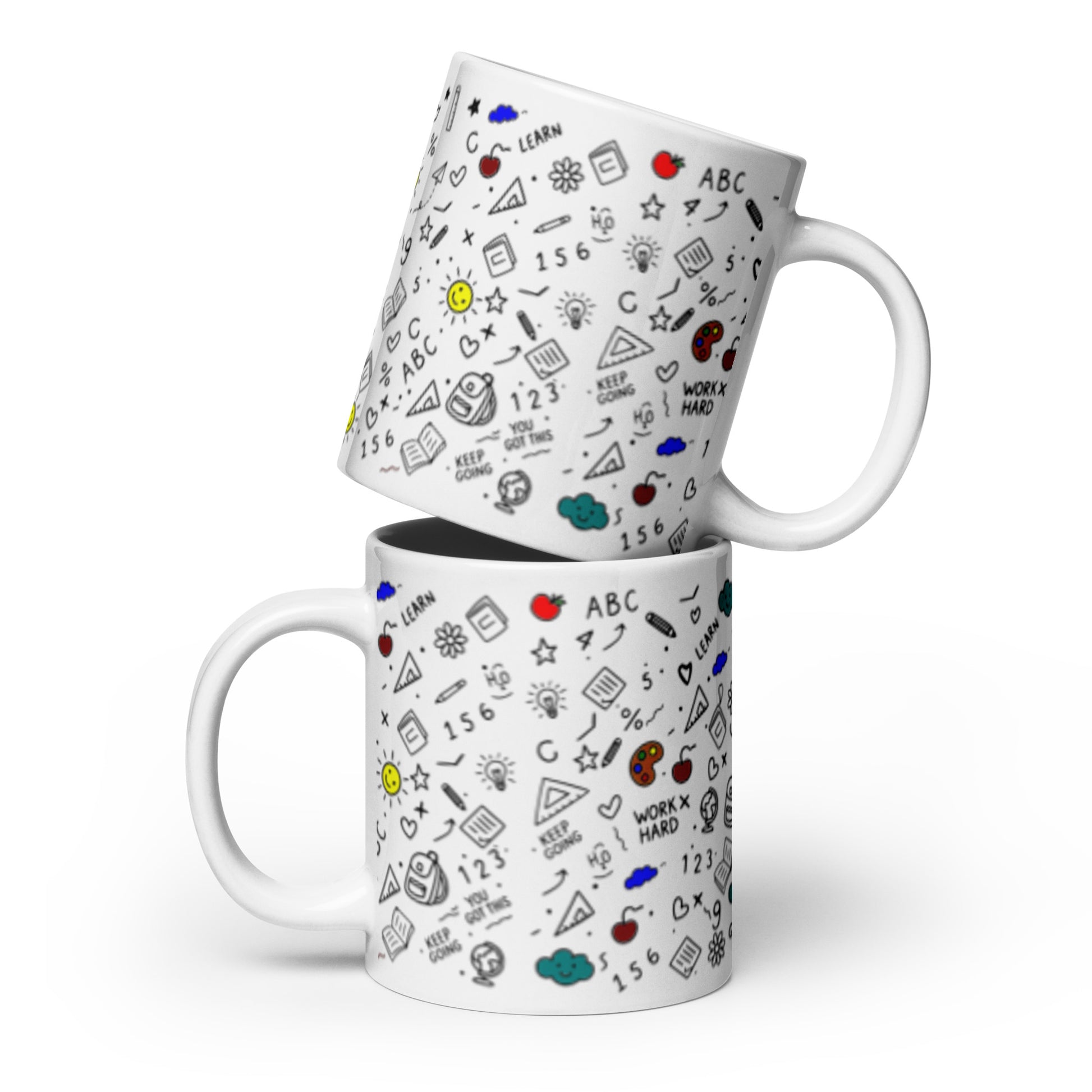 White glossy ceramic mug with colorful hand-drawn school doodle illustration — books, pencils, numbers and happy faces
