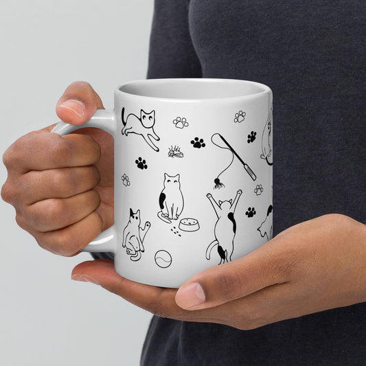 Life of Cats illustrated mug showing playful cats and paw prints, white ceramic glossy finish