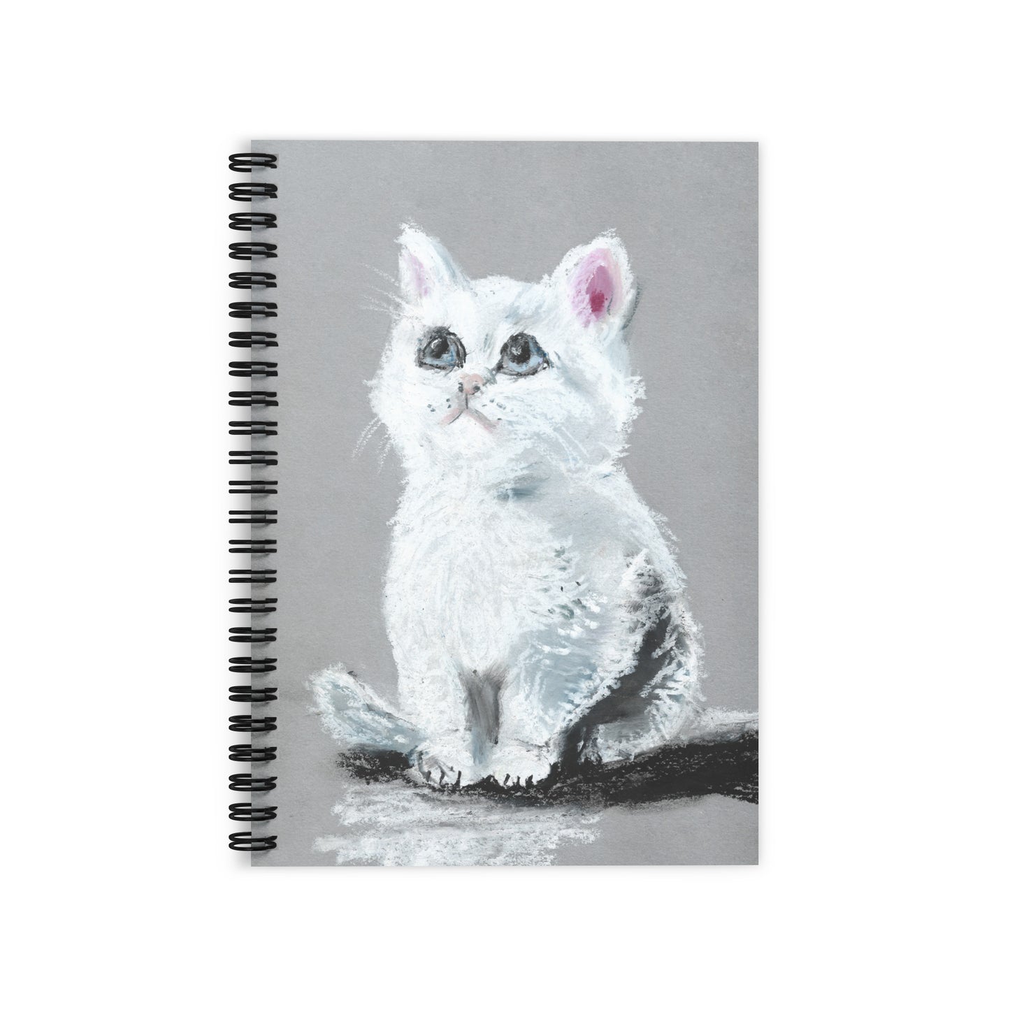 Ruled spiral notebook with a soft pastel drawing of a white kitten with blue eyes on the cover, artwork by artist Lena Kloper