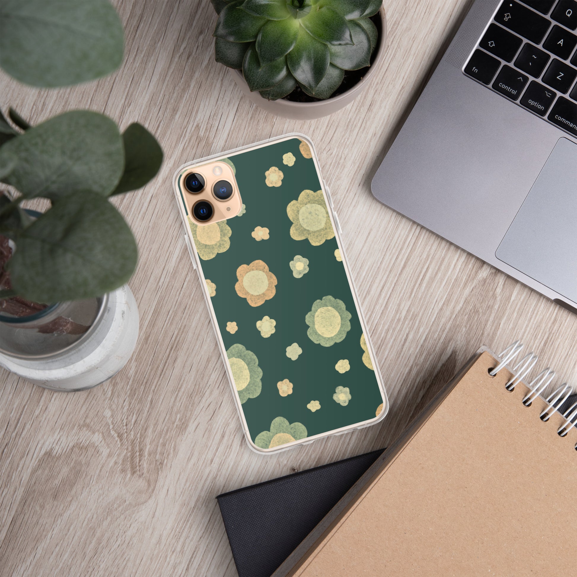 Clear iPhone® case with a retro floral pattern in sage green, terracotta and cream on a deep forest green background — Wish. Bloom. Repeat. by MWL.